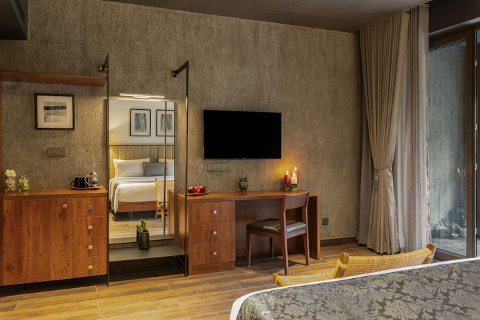 Imagen de la habitación del Hotel Sterling Athirappilly. Foto 16