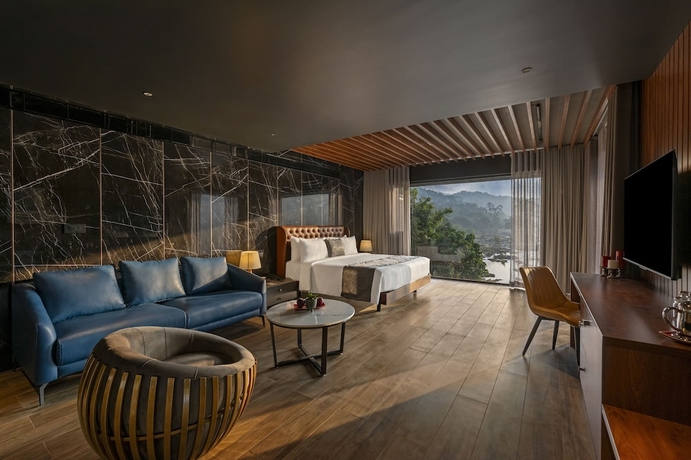 Imagen de la habitación del Hotel Sterling Athirappilly. Foto 17