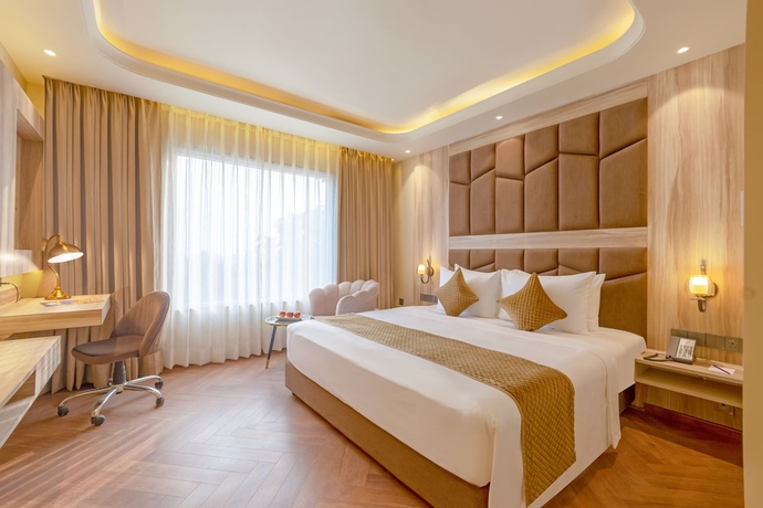 Imagen de la habitación del Hotel Sterling Saryu Ayodhya. Foto 11