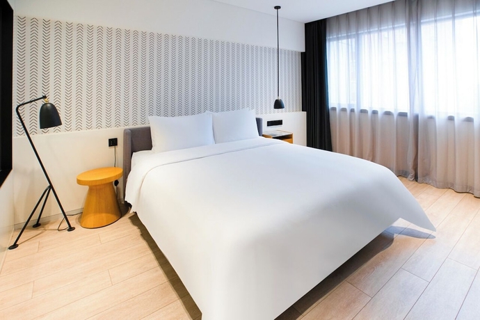 Imagen de la habitación del Hotel Stey Sanlitun Boutique. Foto 12