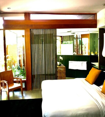 Imagen de la habitación del Hotel Sticky Rice Villas. Foto 18