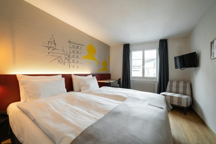 Imagen de la habitación del Hotel Stockalperhof. Foto 17