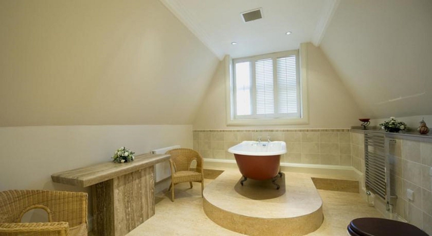 Imagen de la habitación del Hotel Stoke Rochford Hall. Foto 12