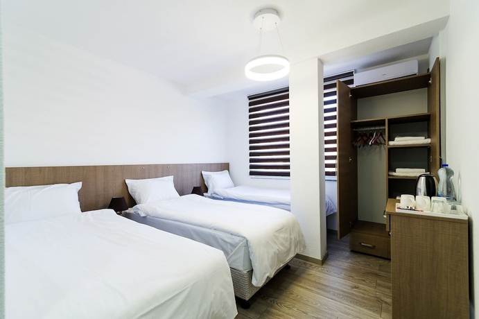 Imagen de la habitación del Hotel Stone Bridge Guesthouse. Foto 9