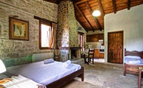 Imagen de la habitación del Hotel Stone Village Apartments. Foto 6