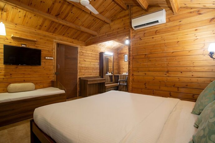 Imagen de la habitación del Hotel Stone Water Eco Resort. Foto 21