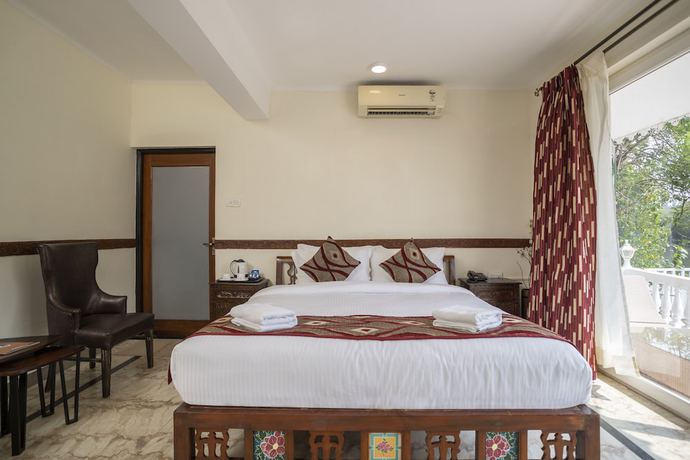 Imagen de la habitación del Hotel Stone Wood River Front. Foto 15