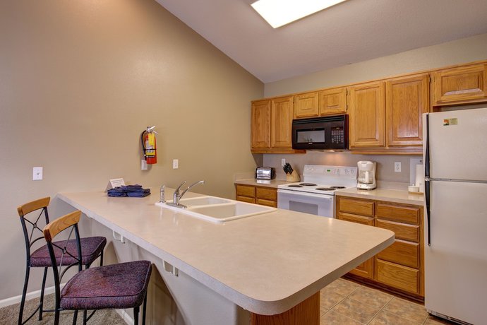 Imagen de la habitación del Hotel Stonebridge Village Resort. Foto 11
