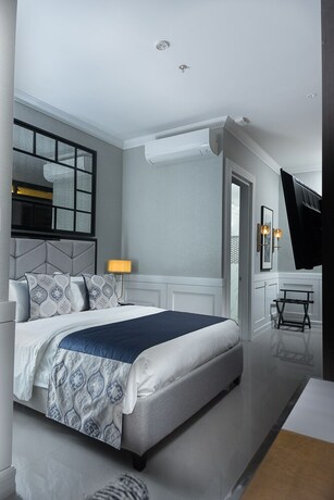 Imagen de la habitación del Hotel Stonehill Suites. Foto 18