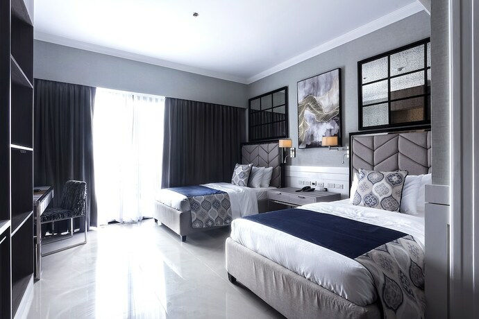 Imagen de la habitación del Hotel Stonehill Suites. Foto 30