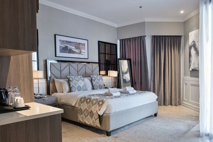 Imagen de la habitación del Hotel Stonehill Suites. Foto 31