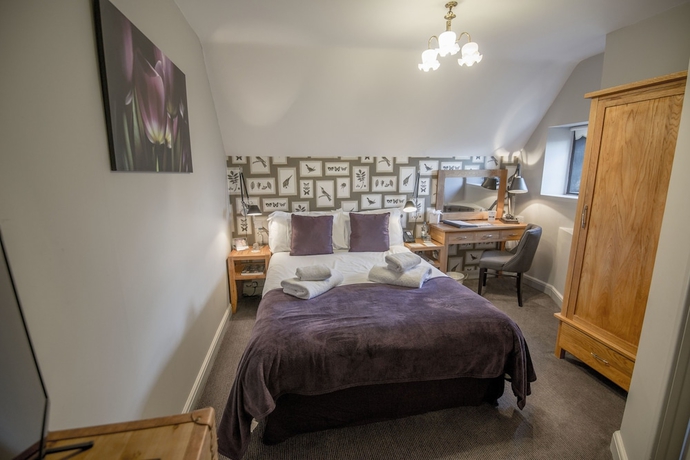 Imagen de la habitación del Hotel Stonehouse Court. Foto 9