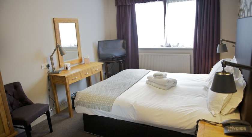 Imagen de la habitación del Hotel Stonehouse Court. Foto 16