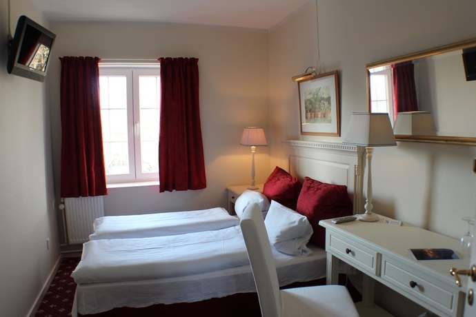 Imagen de la habitación del Hotel Store Restrup Slotshotel. Foto 9