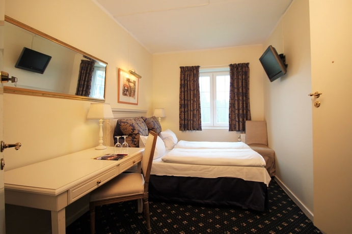 Imagen de la habitación del Hotel Store Restrup Slotshotel. Foto 10