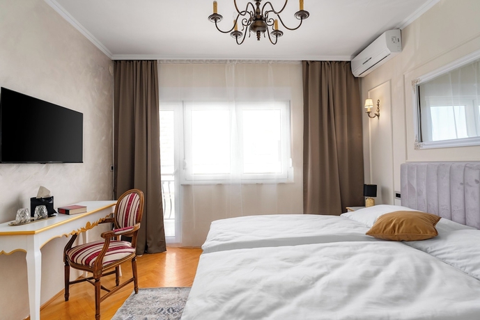 Imagen de la habitación del Hotel Storge Boutique Bed and Breakfast. Foto 12