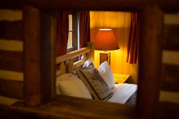 Imagen de la habitación del Hotel Storm Mountain Lodge Cabins and Dining. Foto 15