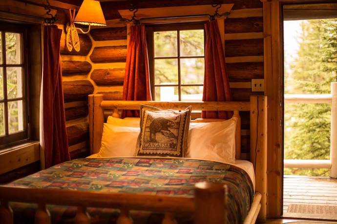 Imagen de la habitación del Hotel Storm Mountain Lodge Cabins and Dining. Foto 19