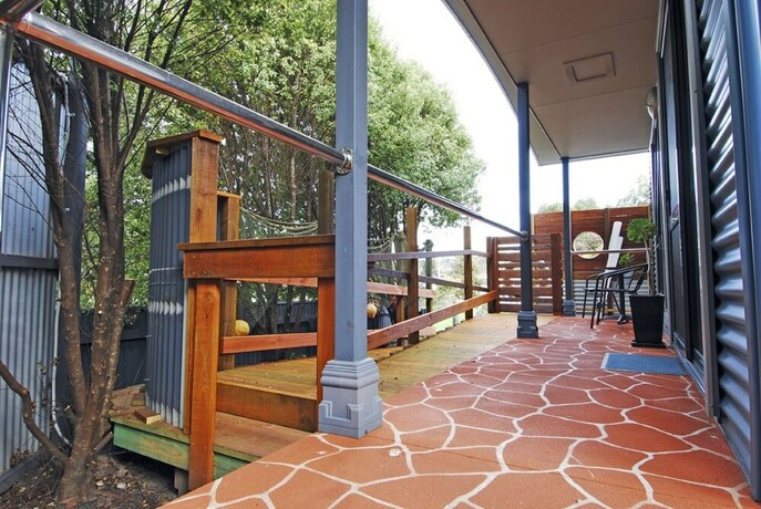 Imagen de la habitación del Hotel Strahan Bungalows. Foto 19