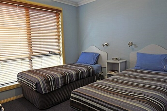 Imagen de la habitación del Hotel Strahan Bungalows. Foto 26