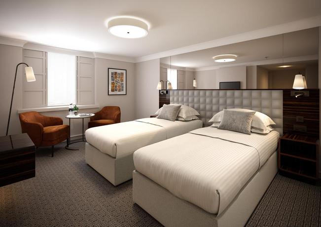 Imagen de la habitación del Hotel Strand Palace. Foto 12