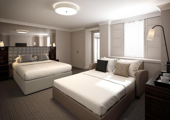 Imagen de la habitación del Hotel Strand Palace. Foto 13