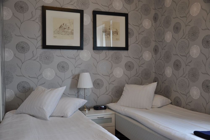Imagen de la habitación del Hotel Strand l, VANERSBORG. Foto 2