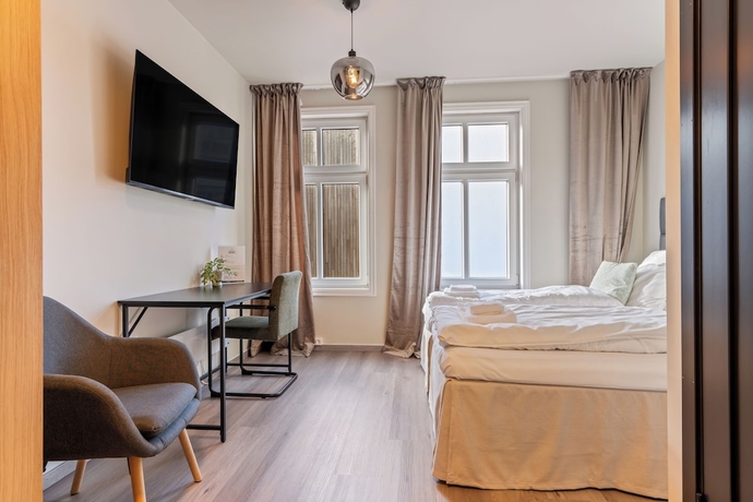 Imagen de la habitación del Hotel Strandgata. Foto 7