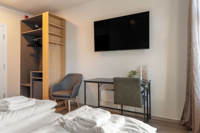 Imagen de la habitación del Hotel Strandgata. Foto 15