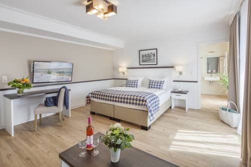 Imagen de la habitación del Hotel Strandgr&uuml;n Golf- and Spa Resort. Foto 3