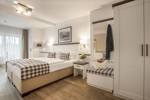 Imagen de la habitación del Hotel Strandgr&uuml;n Golf- and Spa Resort. Foto 14