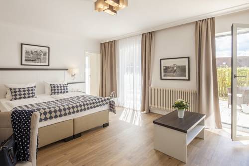 Imagen de la habitación del Hotel Strandgr&uuml;n Golf- and Spa Resort. Foto 16