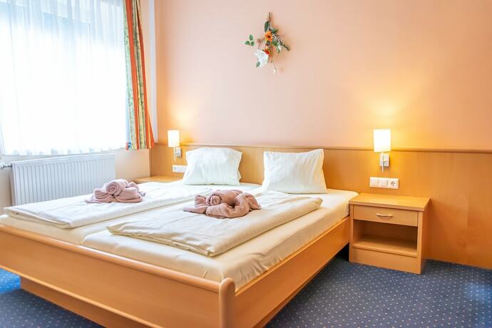 Imagen de la habitación del Hotel Strandhotel Burgstaller. Foto 19