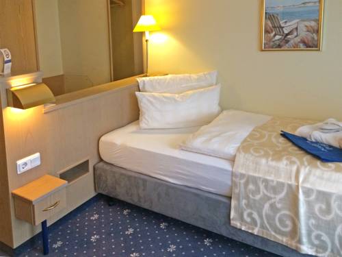 Imagen de la habitación del Hotel Strandhotel Duhnen. Foto 4