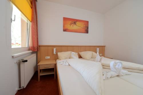 Imagen de la habitación del Hotel Strandhotel Faak. Foto 10