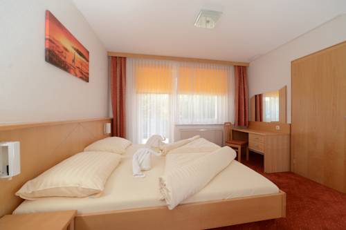 Imagen de la habitación del Hotel Strandhotel Faak. Foto 14