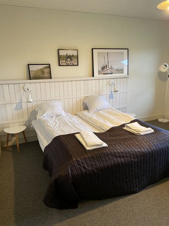 Imagen de la habitación del Hotel Strandhotel Klitrosen. Foto 12