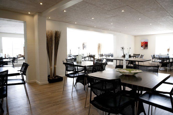 Imagen del bar/restaurante del Hotel Strandhotel Klitrosen. Foto 8