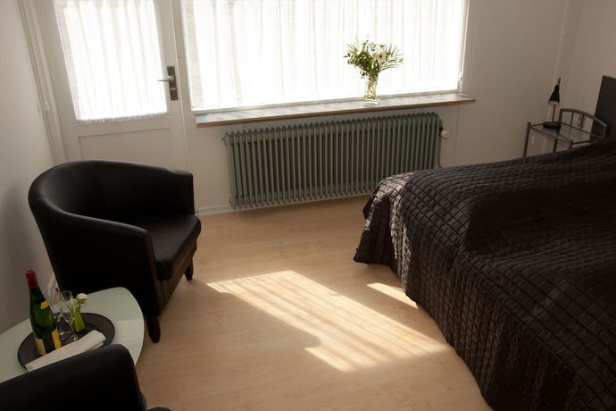 Imagen de la habitación del Hotel Strandhotel Klitrosen. Foto 15