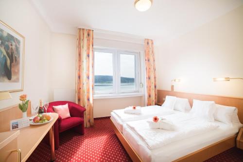 Imagen de la habitación del Hotel Strandhotel L&ouml;chnerhaus. Foto 3