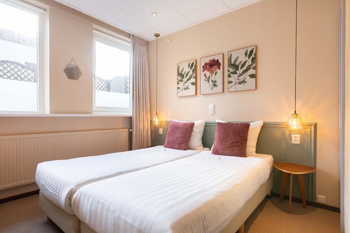 Imagen de la habitación del Hotel Strandhotel Scheveningen. Foto 11
