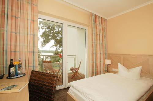 Imagen de la habitación del Hotel Strandhotel Seerose. Foto 9