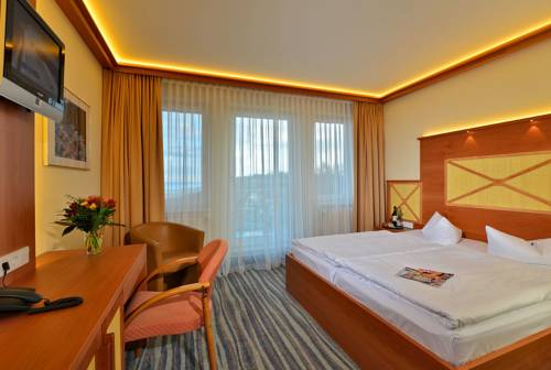 Imagen de la habitación del Hotel Strandhotel Seerose. Foto 15