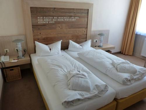 Imagen de la habitación del Hotel Strandhotel Vierjahreszeiten. Foto 9