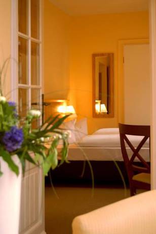 Imagen de la habitación del Hotel Strandvillen Heringsdorf. Foto 2