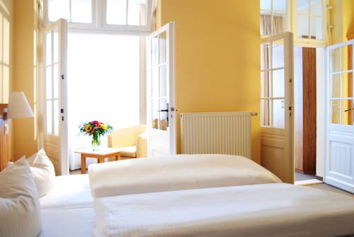 Imagen de la habitación del Hotel Strandvillen Heringsdorf. Foto 4