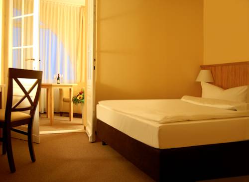 Imagen de la habitación del Hotel Strandvillen Heringsdorf. Foto 6