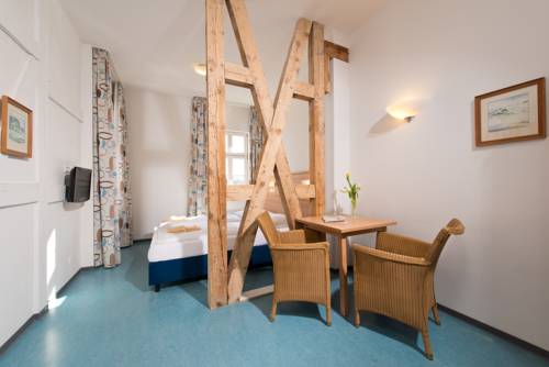 Imagen de la habitación del Hotel Strandvillen Heringsdorf. Foto 13