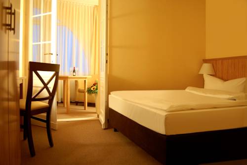 Imagen de la habitación del Hotel Strandvillen Heringsdorf. Foto 16