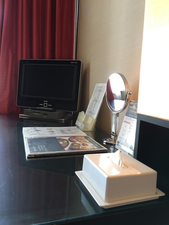 Imagen de la habitación del Hotel Strix Tokyo. Foto 2